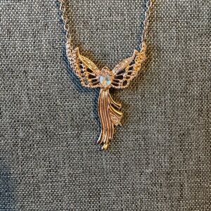 Elegant Gold and Silver Angel Pendant Necklace